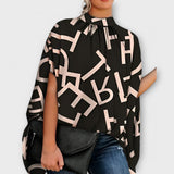 Lurdes- Blusa versátil